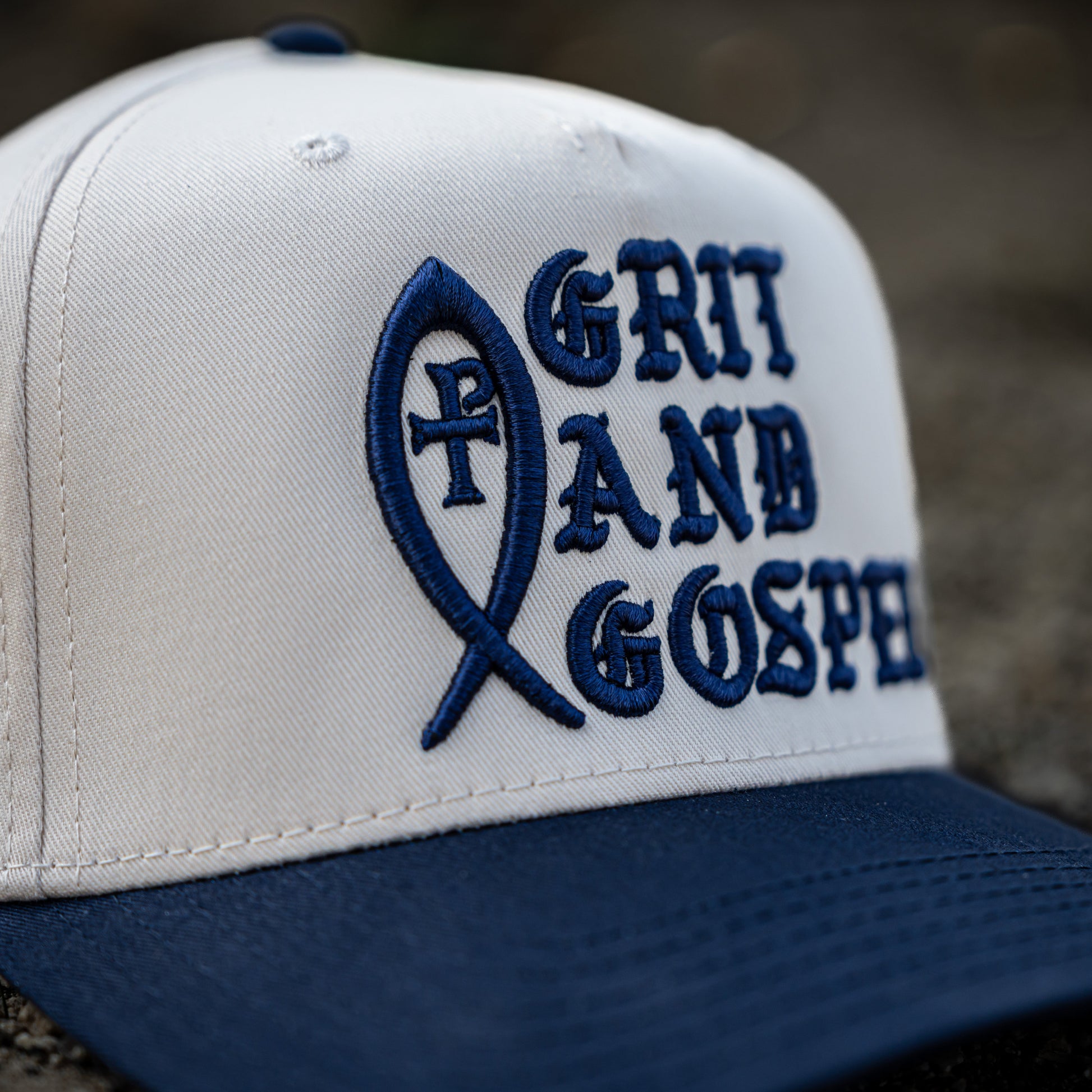 front side profile of two-tone Otto snapback hat with Git and Gospel Embroidery blue color christian apparel Ichthys