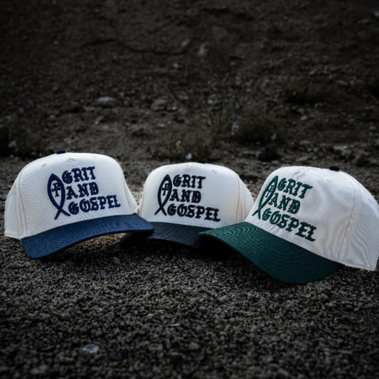 Front of two-tone Otto snapback hat with Grit and Gospel puff embroidery Ichthys christian apparel hat
