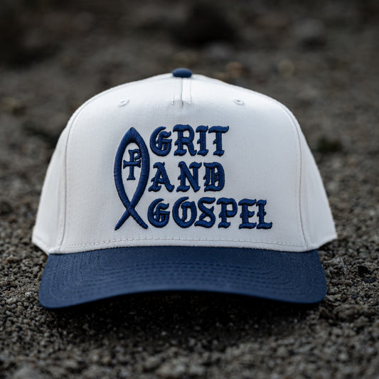 Front of two-tone Otto snapback hat with Grit and Gospel puff embroidery blue color Ichthys christian apparel