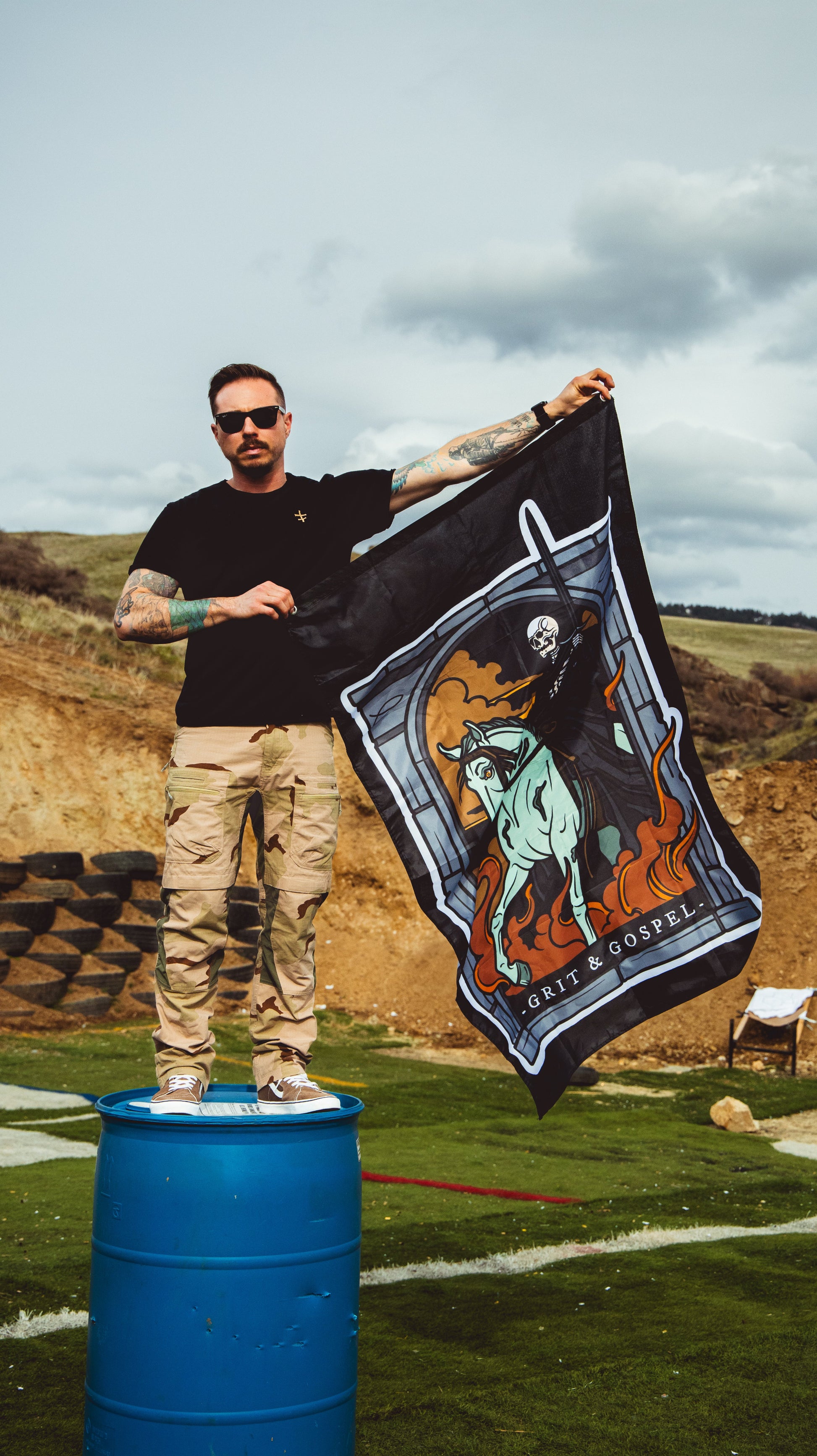 grit and gospel faith-based flag with end times tattoo art valiance